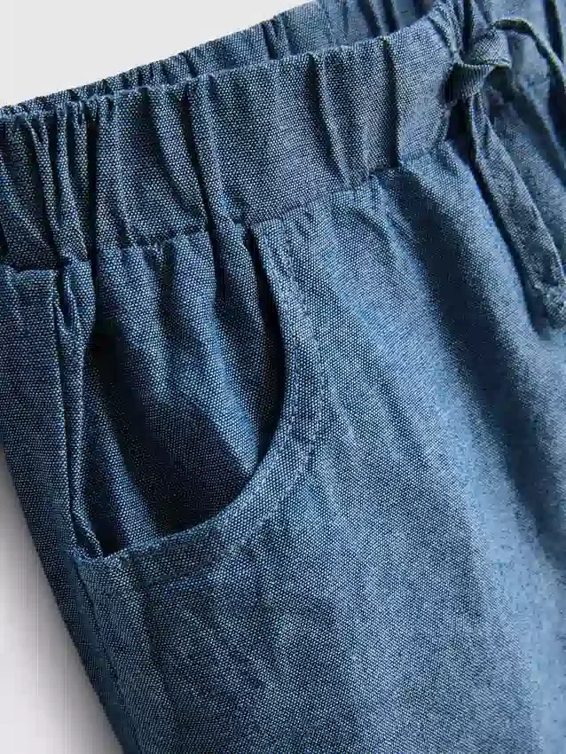 0–12 Monate | Set aus gestreiftem Strick-Polohemd und Shorts