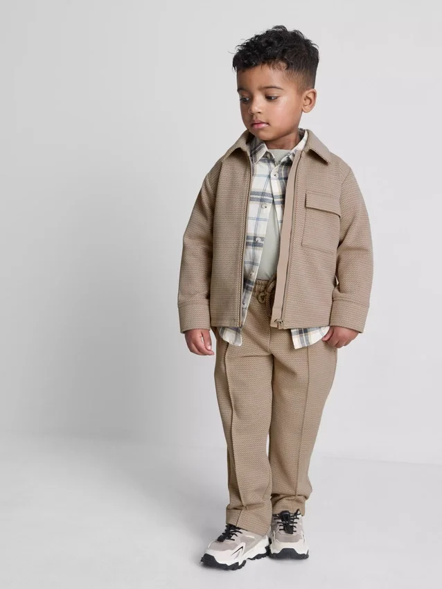 1,5–8 Jahre | Set aus Jacquard-Jacke mit Reissverschluss und Jogginghose