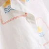 1,5–9 Jahre | Besticktes Set aus ärmellosem Hemd und Shorts