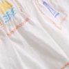 1,5–9 Jahre | Besticktes Set aus ärmellosem Hemd und Shorts