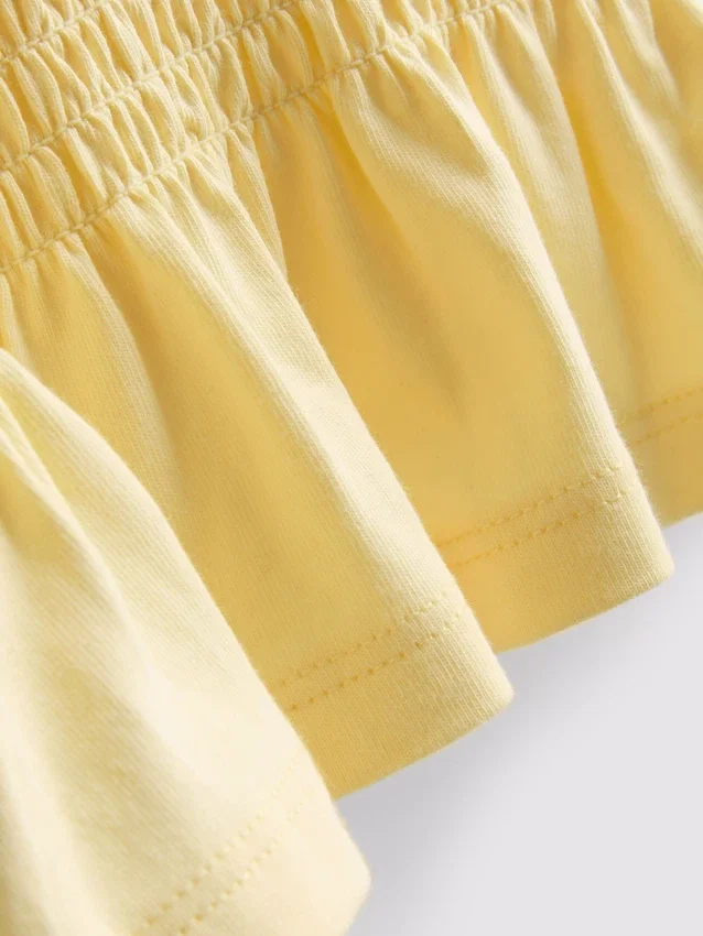 1,5–9 Jahre | gerafftes Peplum-Oberteil