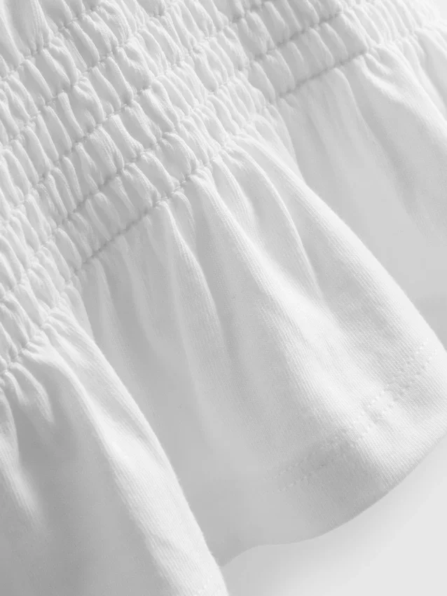 1,5–9 Jahre | gerafftes Peplum-Oberteil