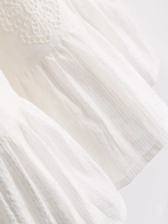 1,5–9 Jahre | Gespickeltes Lochmuster-Kleid