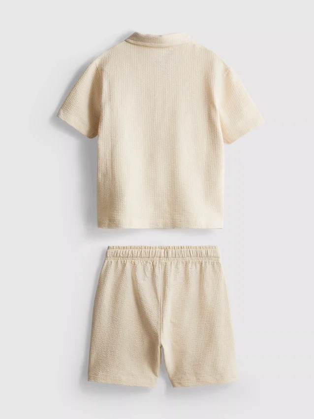1–9 Jahre | Set aus strukturiertem Polohemd und Shorts