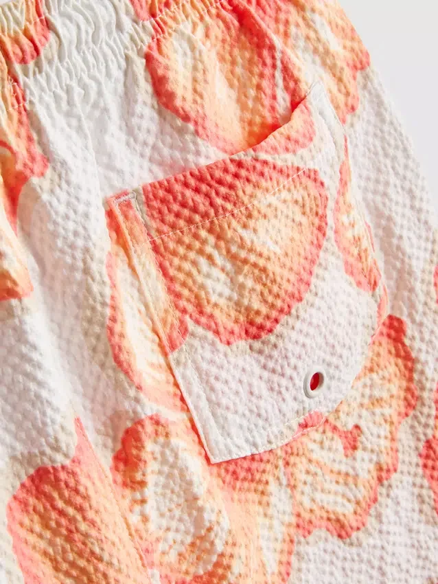 7–15 Jahre | Badeshorts mit Blumenmuster