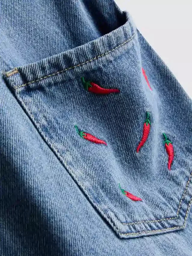 7–15 Jahre | bestickte Jeanslatzhose