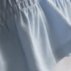 7–15 Jahre | gerafftes Peplum-Hemd