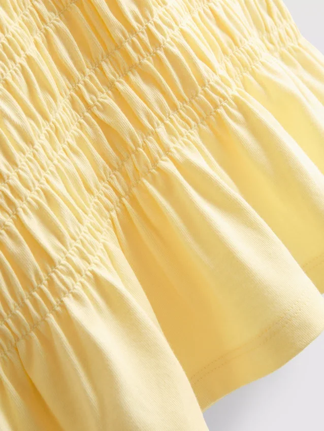 7–15 Jahre | gerafftes Peplum-Hemd