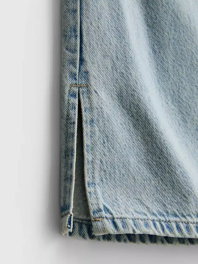 7–15 Jahre | Jeans mit weitem Bein und Schlitz am Saum
