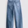 7–15 Jahre | Weite-Jeans mit gestickter Blumen-Schleife