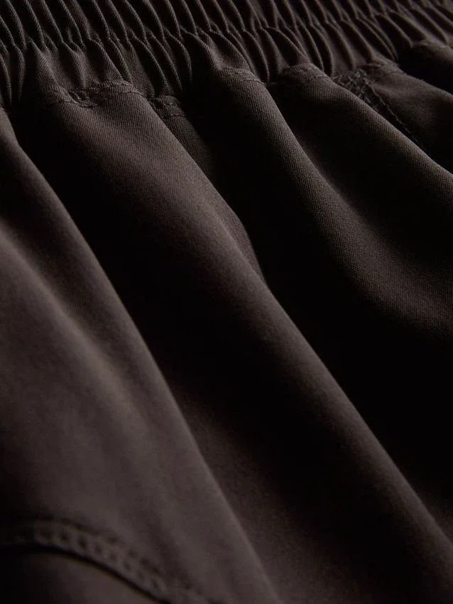 Aktive gewebte Laufshorts