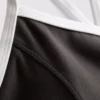 Aktives Crop-Top mit kontrastfarbener Paspelierung und gekreuztem Rücken