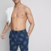 Bade-Shorts mit gesticktem Sonnenmotiv