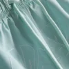 Badeshorts mit Blattstickerei