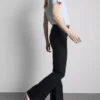 Baumwoll-Denim-Jeans mit mittlerer Leibhöhe und ausgestelltem Bein