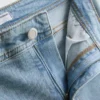 Baumwoll-Denim-Jeans mit mittlerer Leibhöhe und ausgestelltem Bein