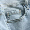 Baumwoll-Denim-Jeans mit mittlerer Leibhöhe und ausgestelltem Bein