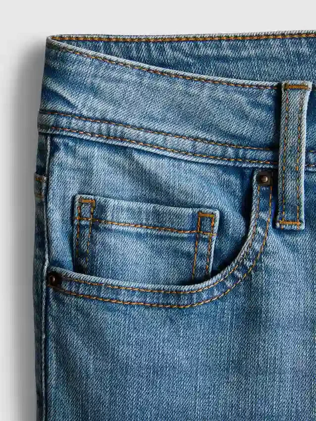 Baumwoll-Denim-Jeans mit mittlerer Leibhöhe und ausgestelltem Bein