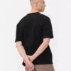 Baumwoll-T-Shirt mit gerolltem Halsausschnitt und lockerer Passform