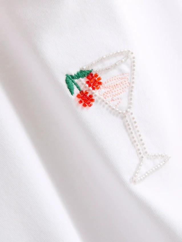 Baumwollreiches, kurzes Baby-T-Shirt mit Perlenverzierung