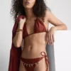 Bikini-Hösli mit Kettenverzierung und seitlichen Bindebändern