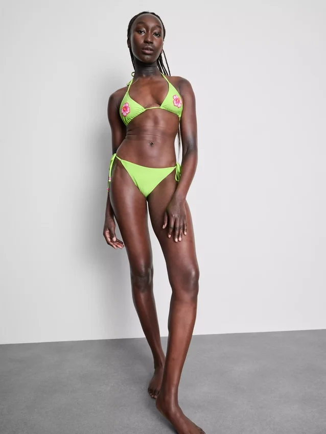 Bikini-Unterteil mit Perlenverzierung und seitlichen Bindebändern