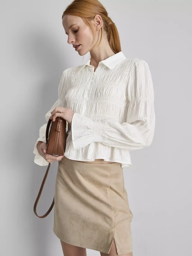 Bluse mit gerafftem Peplum-Saum