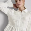 Bluse mit gerafftem Peplum-Saum