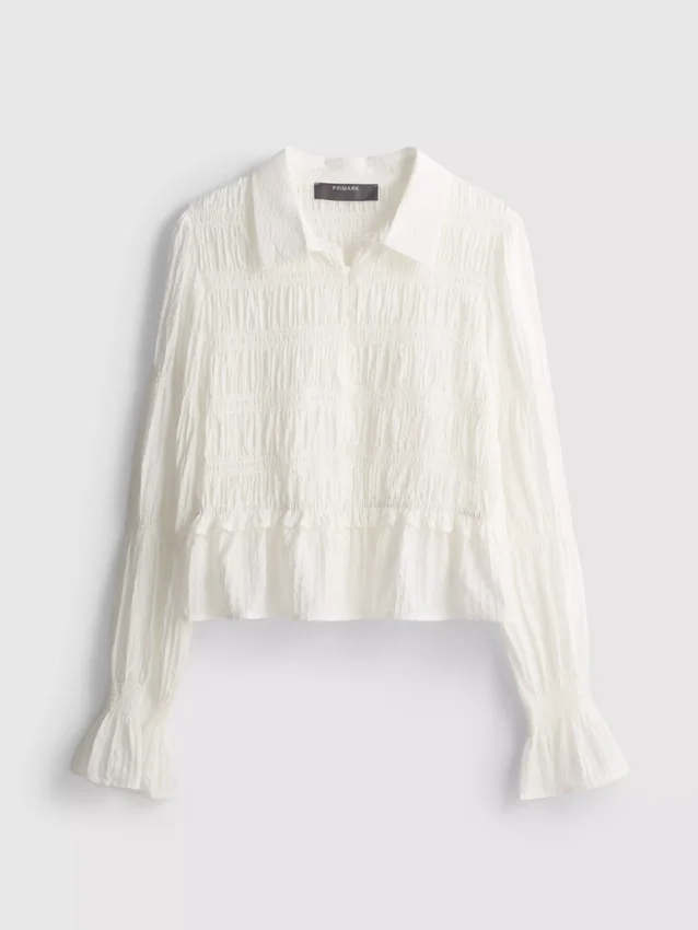 Bluse mit gerafftem Peplum-Saum