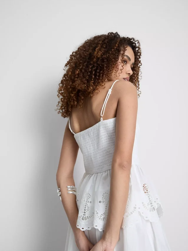 Cami-Top aus Baumwolle mit besticktem Peplum-Saum