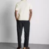 Das gestrickte Polohemd von The Edit