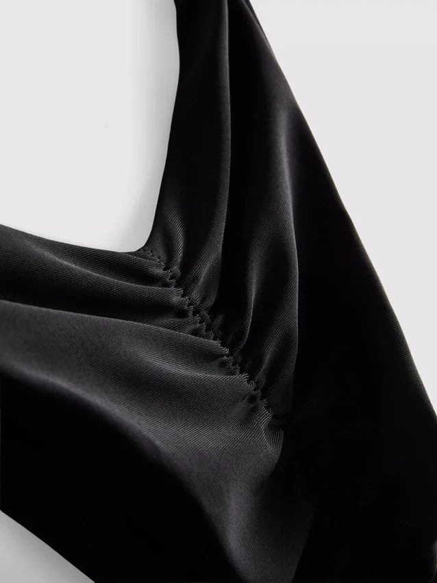 Gerafftes Bikini-Hösli im String-Stil