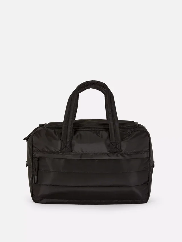 Gesteppte Tasche für unter den Sitz