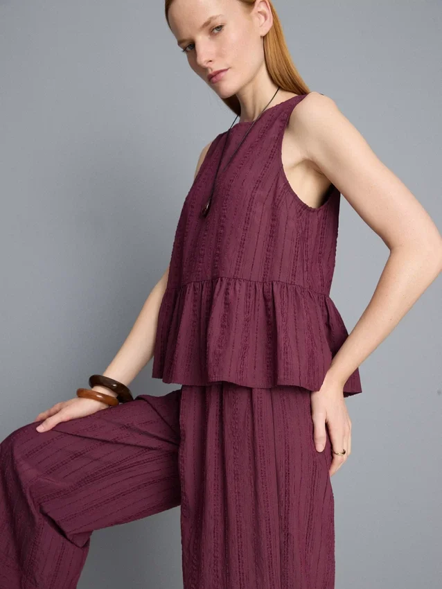 Gestreiftes Tanktop mit Peplum-Saum