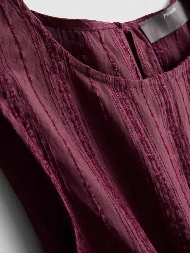 Gestreiftes Tanktop mit Peplum-Saum