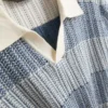 Gestricktes Polohemd mit strukturierten Streifen
