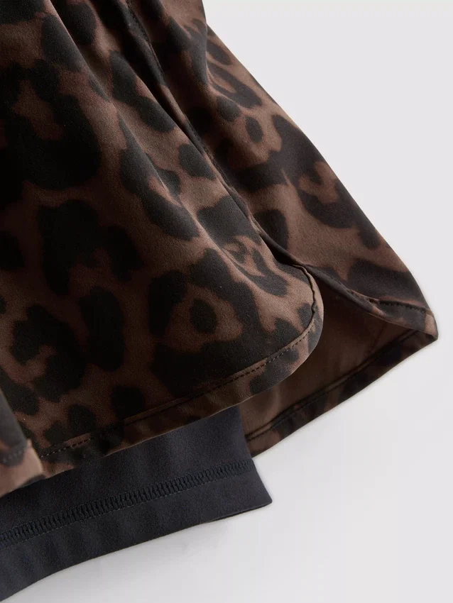 Gewebte Laufshorts mit Leopardenmuster