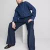 Jeans mit mittlerer Leibhöhe, Gürtel und weitem Bein