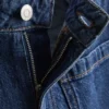 Jeans mit weitem Bein und Taschen vorne