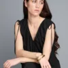 Jumpsuit mit V-Ausschnitt und Ballonbeinen