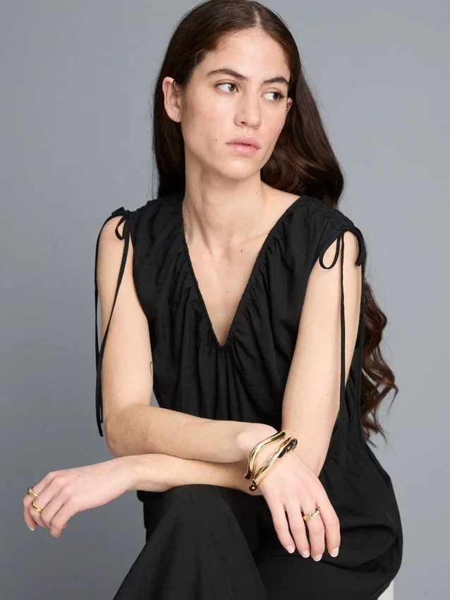 Jumpsuit mit V-Ausschnitt und Ballonbeinen