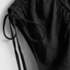 Jumpsuit mit V-Ausschnitt und Ballonbeinen