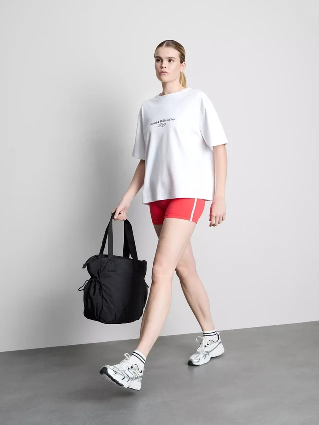 Locker sitzendes Active-T-Shirt aus Baumwolle mit Grafikprint