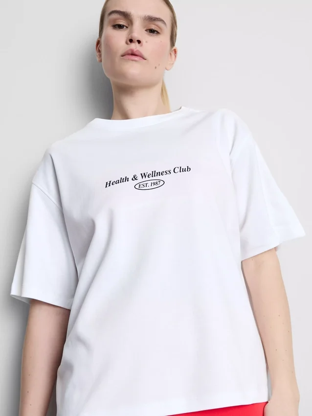 Locker sitzendes Active-T-Shirt aus Baumwolle mit Grafikprint