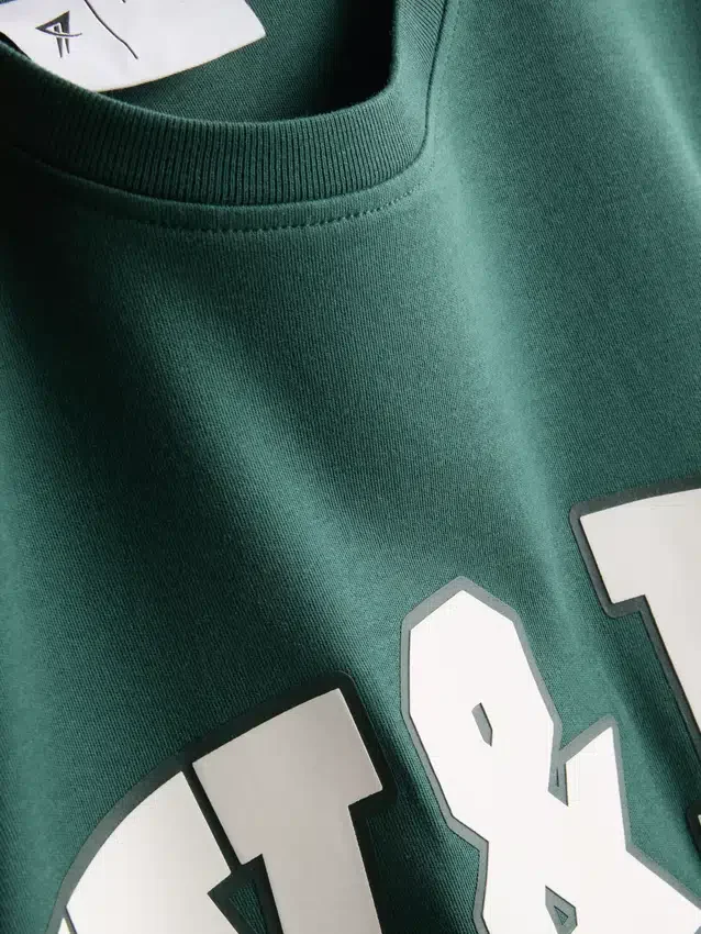 Locker sitzendes Active-T-Shirt aus Baumwolle mit Grafikprint