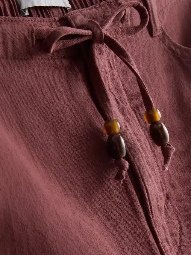 Lässige Shorts aus Baumwolle mit Kordelzug und Perlenverzierung