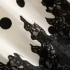 Midi-Rock aus Baumwollmischung mit Spitzenbesatz und Polka-Dots