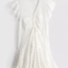 Mini-Kleid aus Baumwolle mit Lochstickerei und Rüschen