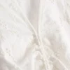 Mini-Kleid aus Baumwolle mit Lochstickerei und Rüschen