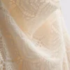 Mini-Kleid mit Häkel-Halterausschnitt und Wasserfallkragen